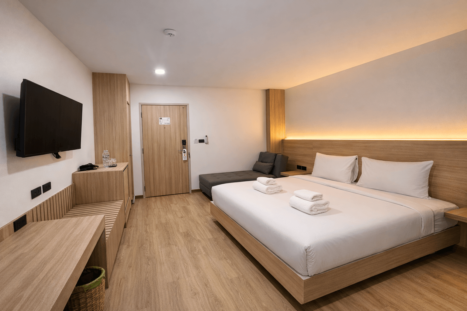 Standard Double bedroom with a large bed and soft lighting